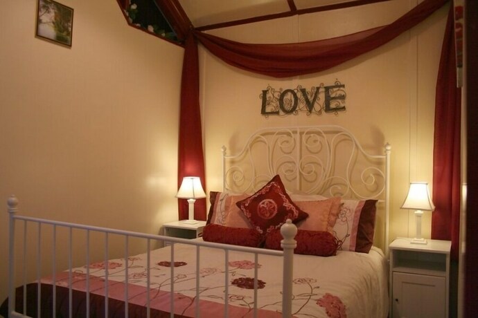 Imagen de la habitación del Hotel Lotus Lodges. Foto 25