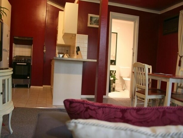 Imagen de la habitación del Hotel Lotus Lodges. Foto 27