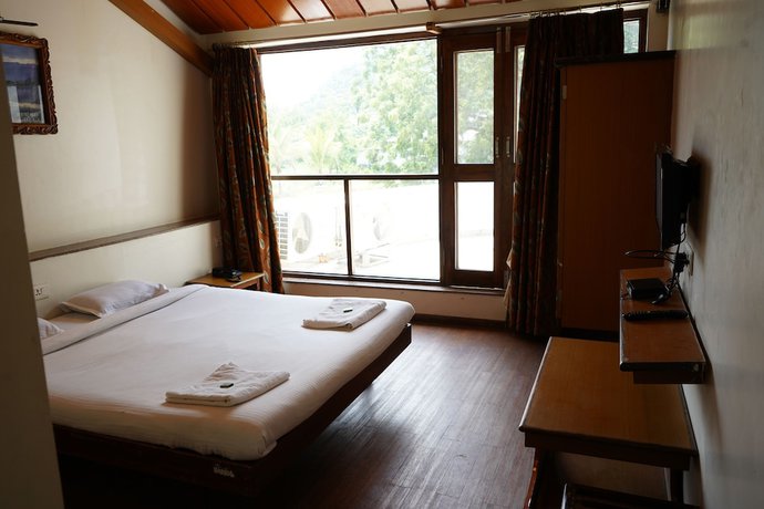 Imagen de la habitación del Hotel Lotus Resort. Foto 8