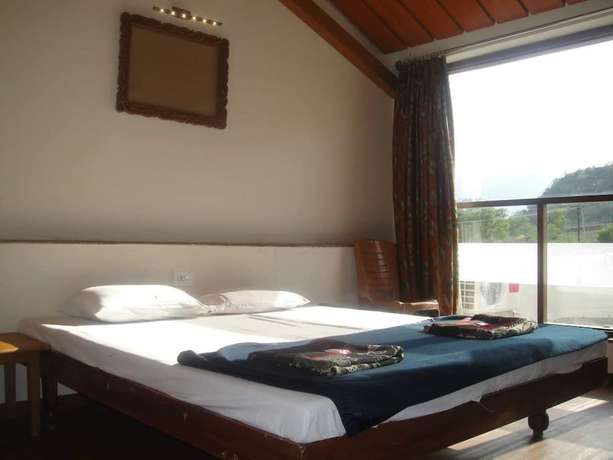 Imagen de la habitación del Hotel Lotus Resort. Foto 14