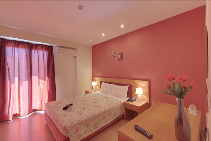 Imagen de la habitación del Hotel Lotus Rise. Foto 7