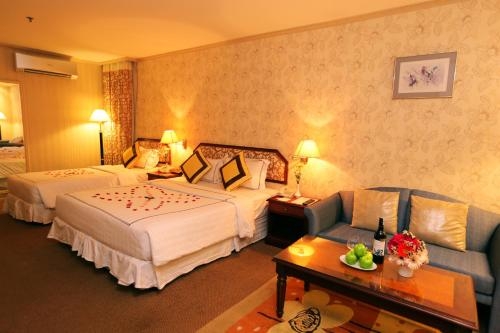 Imagen de la habitación del Hotel Lotus Saigon. Foto 6