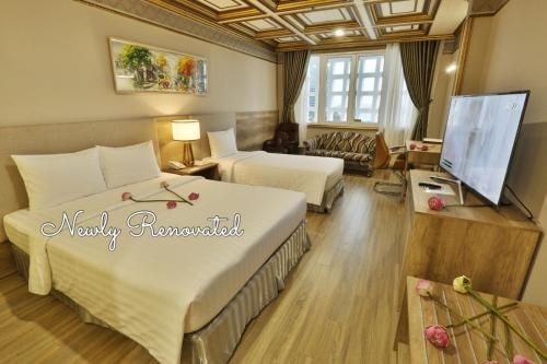 Imagen de la habitación del Hotel Lotus Saigon. Foto 9