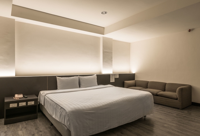 Imagen de la habitación del Hotel Lotus Yuan Business. Foto 12
