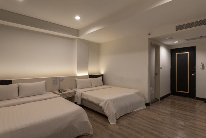 Imagen de la habitación del Hotel Lotus Yuan Business. Foto 14