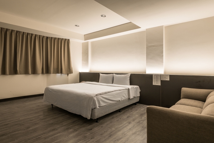 Imagen de la habitación del Hotel Lotus Yuan Business. Foto 19