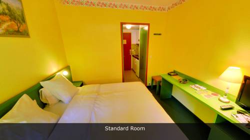 Imagen de la habitación del Hotel Lou Paradou. Foto 8