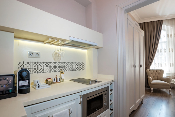 Imagen de la habitación del Hotel Louis Appartements Galata. Foto 5