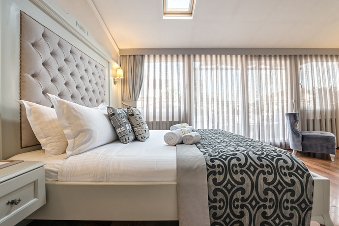 Imagen de la habitación del Hotel Louis Appartements Galata. Foto 10