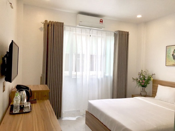Imagen de la habitación del Hotel Louis Hotel - Bui Vien Walking Street. Foto 4