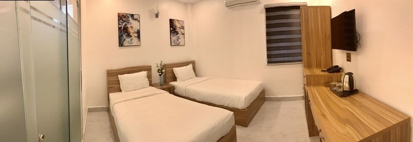 Imagen de la habitación del Hotel Louis Hotel - Bui Vien Walking Street. Foto 8
