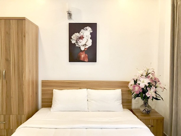 Imagen de la habitación del Hotel Louis Hotel - Bui Vien Walking Street. Foto 12