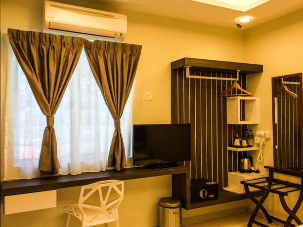 Imagen de la habitación del Hotel Louis, Kampung Jambu. Foto 3