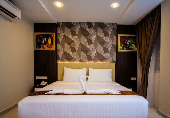 Imagen de la habitación del Hotel Louis, Kampung Jambu. Foto 5