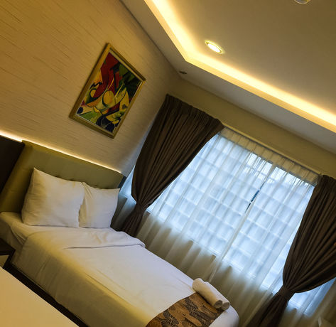 Imagen de la habitación del Hotel Louis, Kampung Jambu. Foto 14