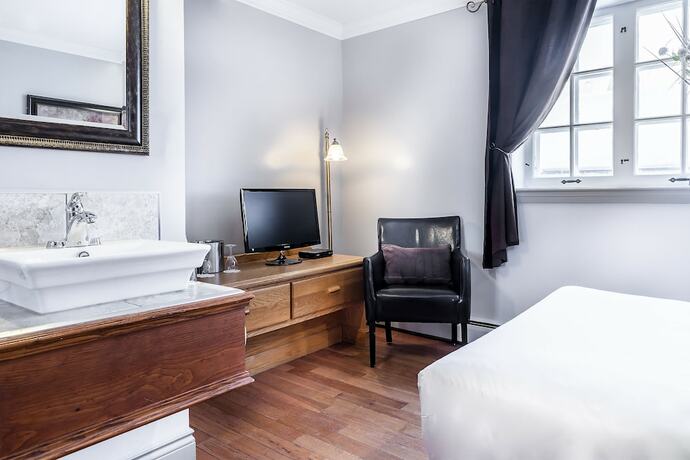 Imagen de la habitación del Hotel Louisbourg. Foto 17