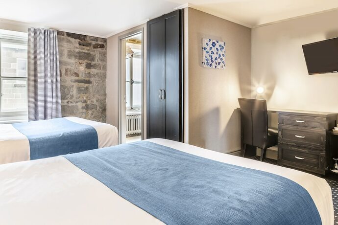 Imagen de la habitación del Hotel Louisbourg. Foto 18