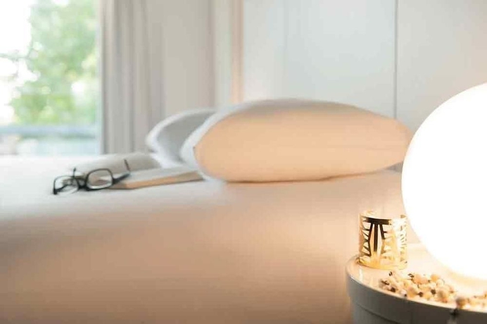 Imagen de la habitación del Hotel Louise. Foto 14