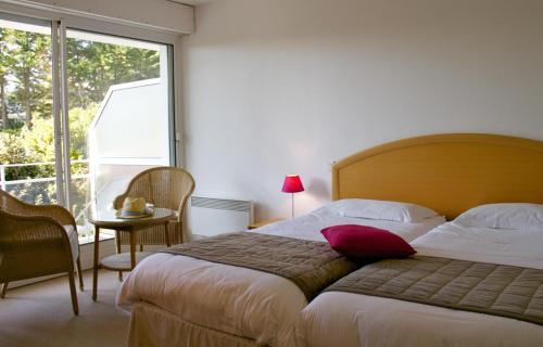 Imagen de la habitación del Hotel Louison Appart & Suite. Foto 7