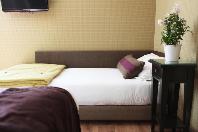 Imagen de la habitación del Hotel Louison. Foto 11