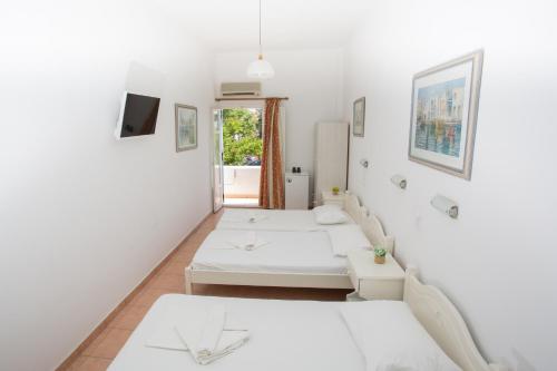 Imagen de la habitación del Hotel Louiza. Foto 7