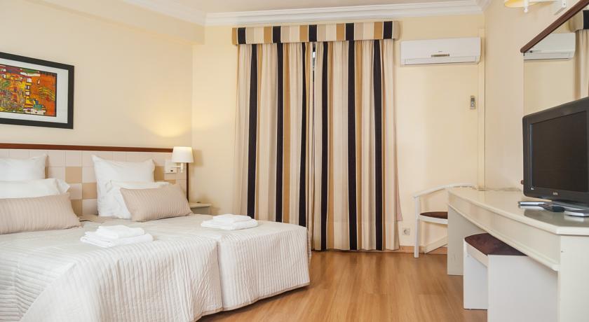 Imagen de la habitación del Hotel Loule Jardim. Foto 7