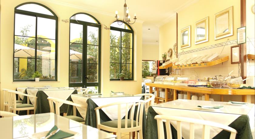 Imagen del bar/restaurante del Hotel Loule Jardim. Foto 3