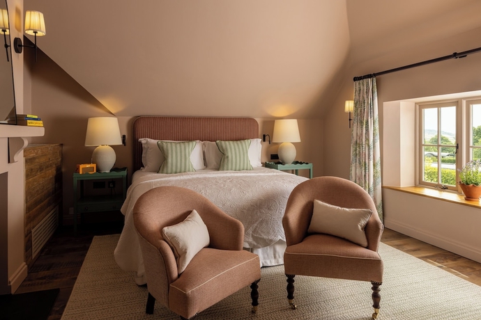 Imagen de la habitación del Hotel Louma Country. Foto 9