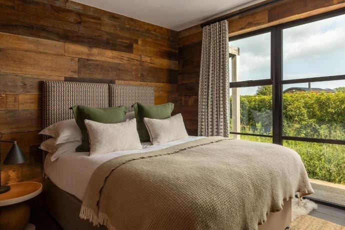 Imagen de la habitación del Hotel Louma Country. Foto 15