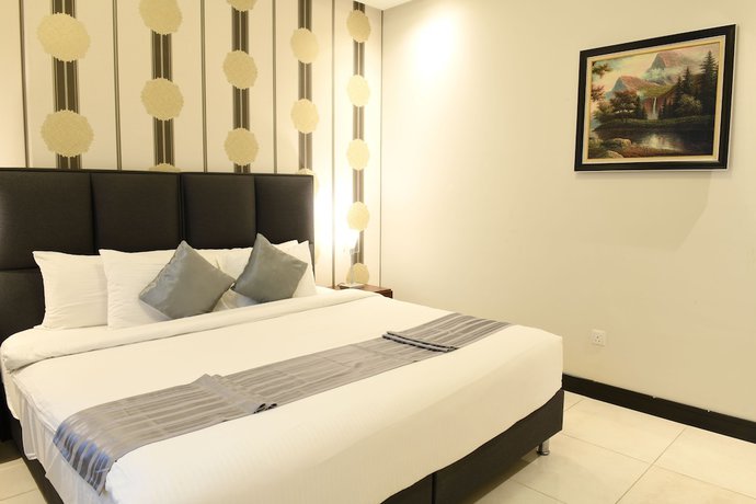 Imagen de la habitación del Hotel Loumage Suites and Spa. Foto 9