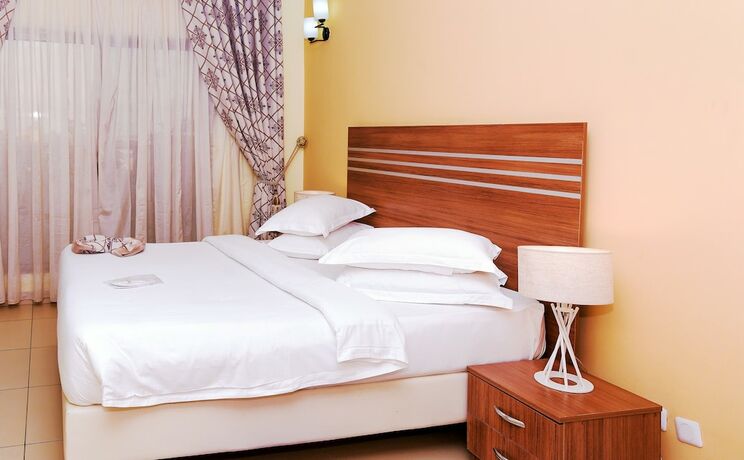 Imagen de la habitación del Hotel Loumia Residency. Foto 14