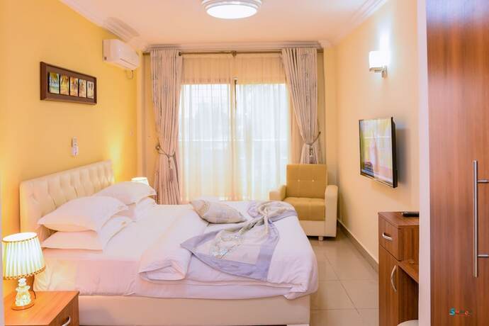 Imagen de la habitación del Hotel Loumia Residency. Foto 16