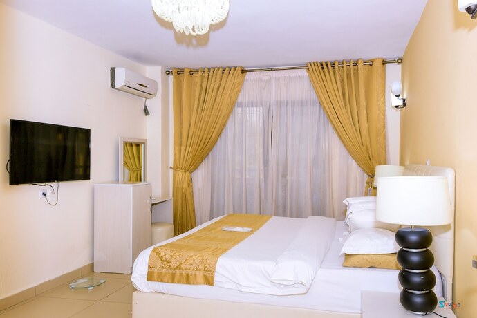 Imagen de la habitación del Hotel Loumia Residency. Foto 19
