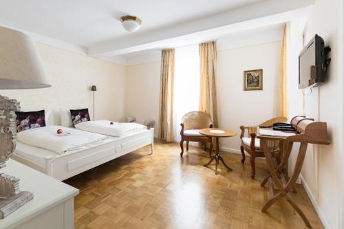 Imagen de la habitación del Hotel L&ouml;wen-Weinstube. Foto 7