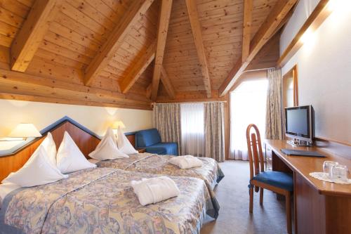 Imagen de la habitación del Hotel L&ouml;wenhof, Neustift - Novacella. Foto 10