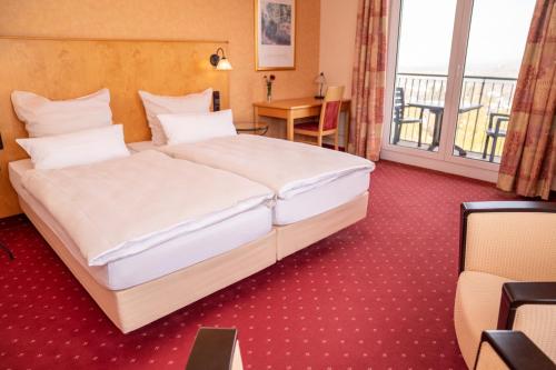 Imagen de la habitación del Hotel L&ouml;wenstein. Foto 7