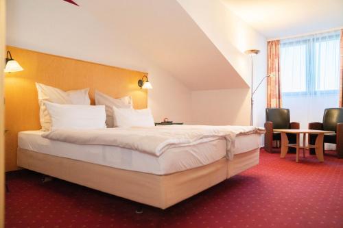 Imagen de la habitación del Hotel L&ouml;wenstein. Foto 8