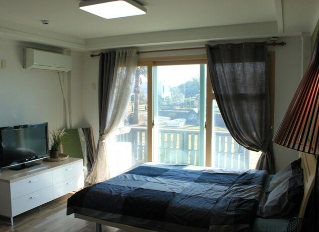 Imagen de la habitación del Hotel Lounge House Jejuda. Foto 18