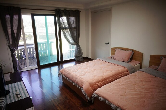 Imagen de la habitación del Hotel Lounge House Jejuda. Foto 21