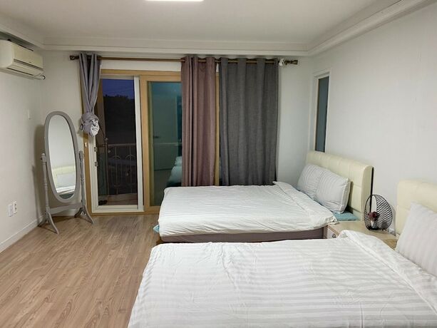 Imagen de la habitación del Hotel Lounge House Jejuda. Foto 26
