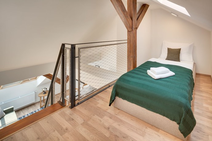 Imagen de la habitación del Hotel Louren Apartments. Foto 11