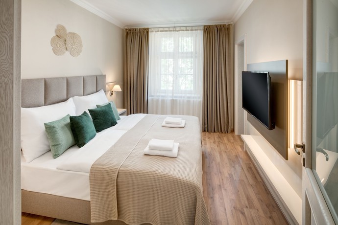 Imagen de la habitación del Hotel Louren Apartments. Foto 16