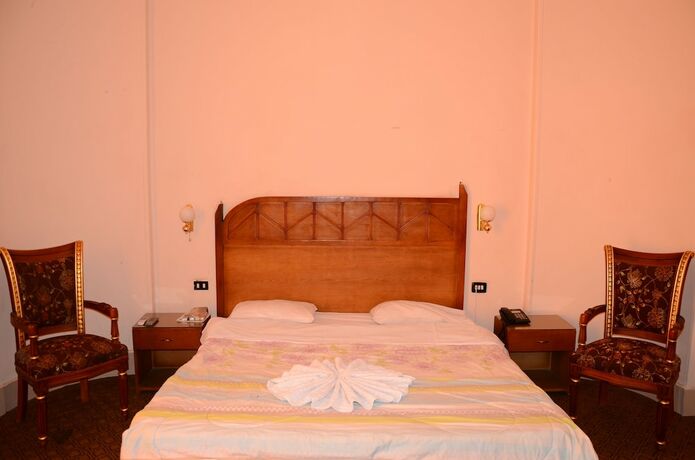 Imagen de la habitación del Hotel Louris inn. Foto 3