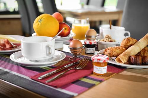 Imagen de la habitación del Hotel L'oustal De Vézac. Foto 9