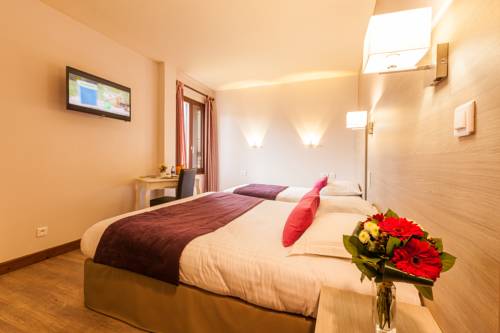 Imagen de la habitación del Hotel L'oustal De Vézac. Foto 10