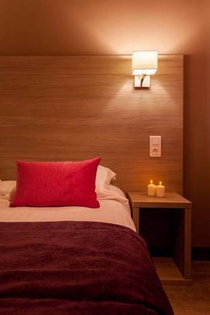 Imagen de la habitación del Hotel L'oustal De Vézac. Foto 11