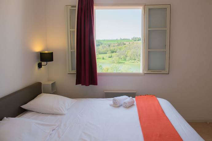 Imagen de la habitación del Hotel L'oustal Del Carlat. Foto 5