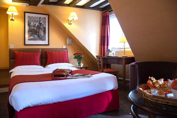 Imagen de la habitación del Hotel Louvre Marsollier Opéra. Foto 10