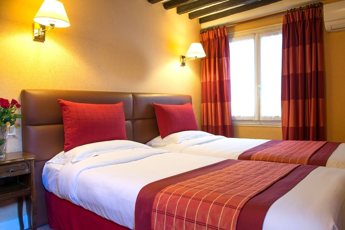 Imagen de la habitación del Hotel Louvre Marsollier Opéra. Foto 11