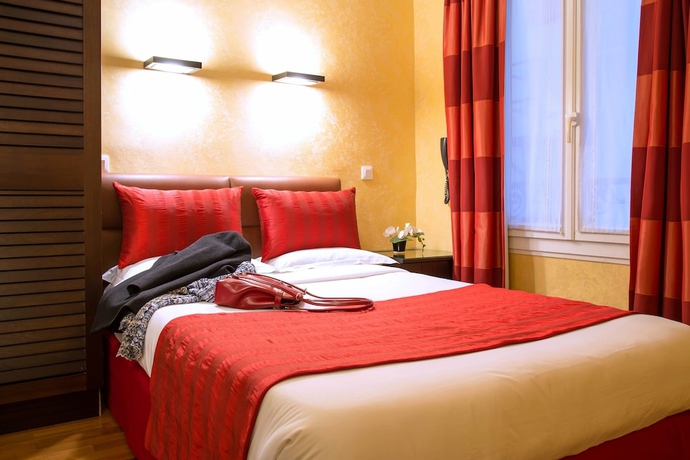 Imagen de la habitación del Hotel Louvre Marsollier Opéra. Foto 13